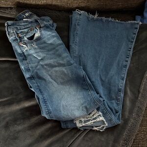 Distressed Blue Jeans